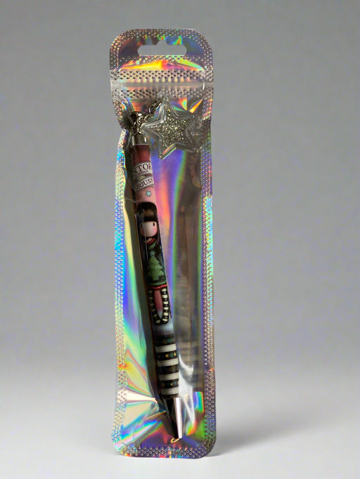 Decorative dart in a holographic packaging on a brown background